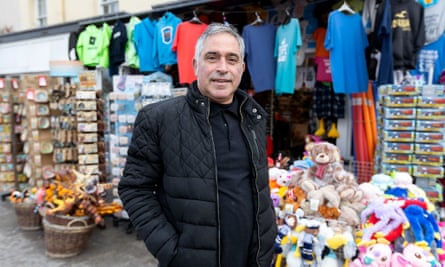 Kia Zarezadeh outside his shop by the harbour