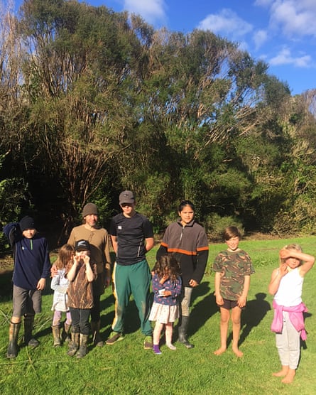 Joey Moncarz and children who attend the Deep Green Bush School in New Zealand.