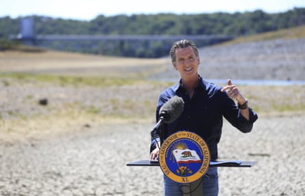 Governor Gavin Newsom holds a news conference in the parched basin of Lake Mendocino in Ukiah.