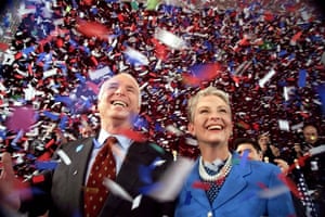 Republican presidential candidate Sen. John McCain, R-Ariz., and his wife Cindy, smile as confetti falls on them at the end of their 114th New Hampshire town hall meeting with voters at the Peterborough Town House in Peterborough, N.H., Sunday afternoon Jan 30, 2000.