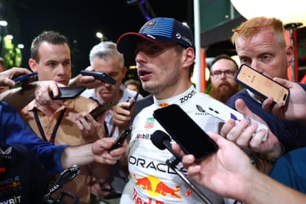 Max Verstappen talks to the F1 media in the paddock.