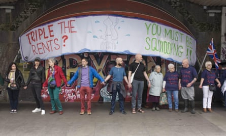 Protesters under the railway arches on Atlantic Road, Brixton.
