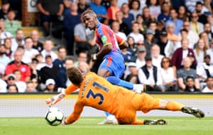 Wilfried Zaha puts the ball past Fabricio Agosto Ramirez.