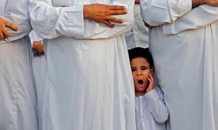 Morning prayer to celebrate Eid al-Fitr, marking the end of Ramadan in Gaza City.
