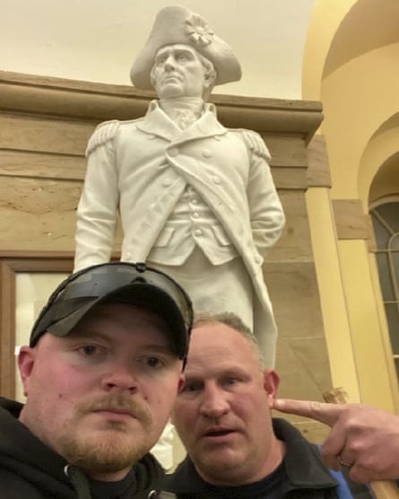 Thomas TJ Robertson and Jacob Fracker in the Capitol in the Capitol on 6 January.