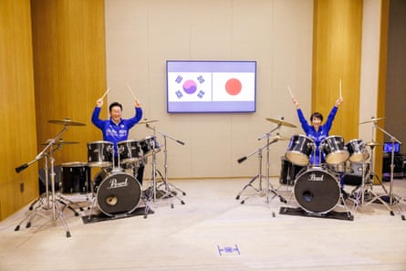 South Korea’s President Lee Jae Myung (L) and Japan’s Prime Minister Sanae Takaichi playing drums, in Nara