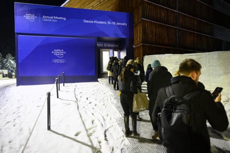 Participants queuing up to go through security at the main entrance of the Congress Centre of the World Economic Forum (WEF) in Davos today