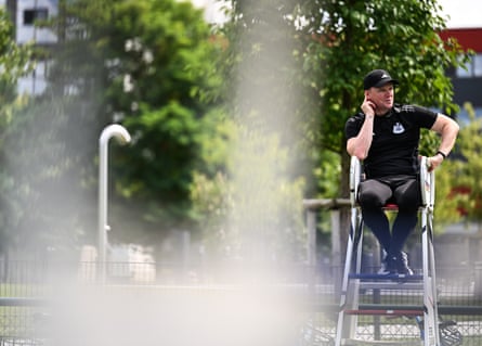 Eddie Howe in an umpire’s chair during Newcastle’s training camp.