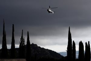 A helicopter arives to transfer the remains