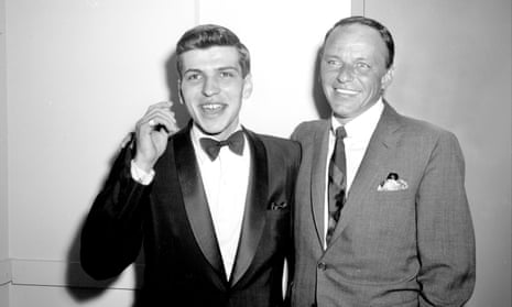 Frank Sinatra Jr with his father after a performance at the Hotel Americana, New York, 1963.