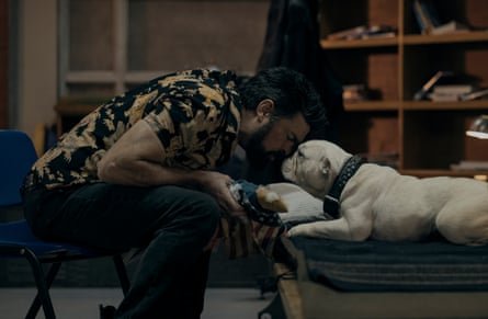 Karl Urban with a bulldog