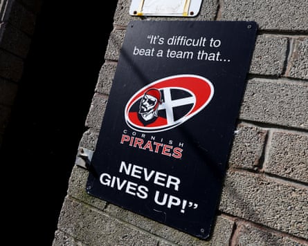 A sign at the Cornish Pirates ground in Penzance saying 'It's difficult to beat a team that never gives up'