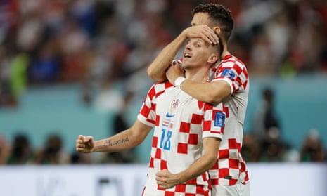 Mislav Orsic is congratulated by Ivan Perisic after he scored Croatia's second goal.