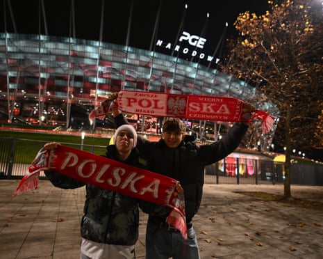Poland fans arrive at the stadium for the match against Netherlands.