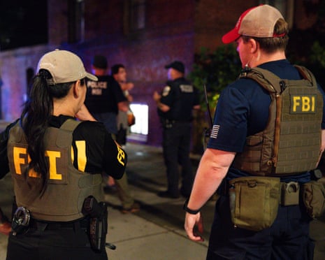 Nearly half of FBI agents in major offices reassigned to immigration enforcement | FBI | The Guardian