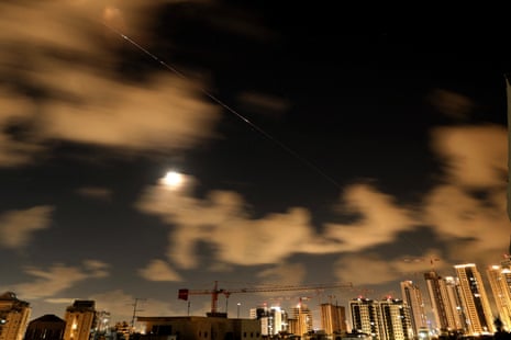 Rocket trails are seen in the sky above the Netanya, Israel.