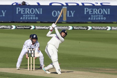 Smriti Mandhana lofts nan shot for a six arsenic India build a beardown lead successful their 2nd innings