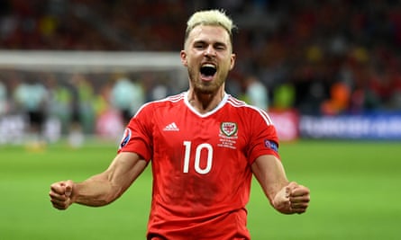 Aaron Ramsey celebrates after Wales’ win over Belgium.
