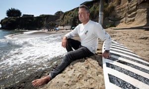 Shawn Dollar on Privates Beach in Santa Cruz, California, which costs $100 a year to access. 