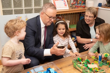 Anthony Albanese playing with kids at a table