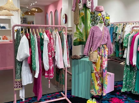 Clothes hanging up for sale in La Frange a l’Envers, Paris.