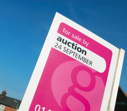House sale under auction sign
