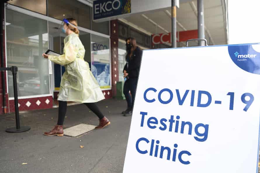 A health worker walks outside a Covid-19 testing clinic in Brisbane on Tuesday.