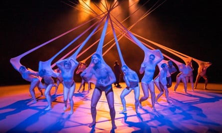 A scene from Free Your Mind with dancers with stockings over their faces and bodies