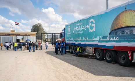 A truck of a humanitarian aid convoy parked outside Rafah border gate, Egypt.
