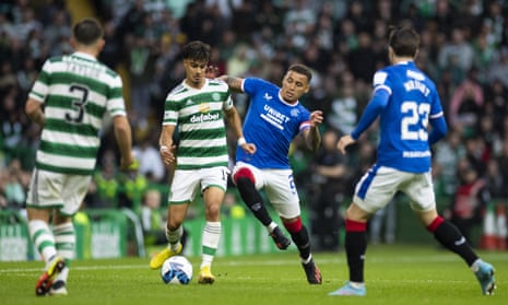 Rangers’ James Tavernier tackles Jota of Celtic during the Old Firm match in September