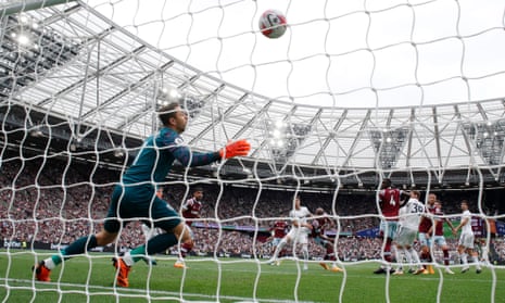 Clean strike: Leeds United's Rodrigo scores their first goal past West Ham United's Lukasz Fabianski.