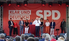 German Chancellor Olaf Scholz speaks on stage in Jena, eastern Germany on 27 August 2024, during an electoral campaign meeting of the Social Democratic Party (SPD), ahead of Thuringia's State elections.