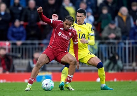 Rio Ngumoha on the ball in front of Pedro Porro