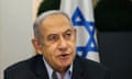 Benjamin Netanyahu with Israeli flag in background