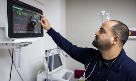 Edoardo Gongora looking at a readout