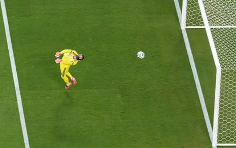 Lionel Messi scores their first goal past Algeria’s Luca Zidane