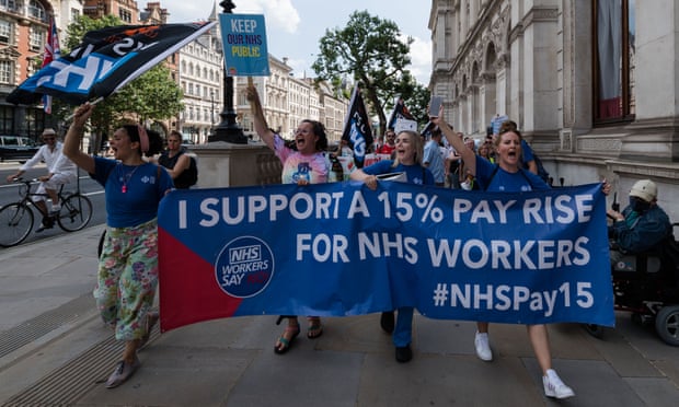 NHS staff, trade union members and health campaigners protest about pay