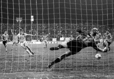 Wolfgang Funkel slots the ball past Dynamo Dresden keeper Jens Ramme from the penalty spot