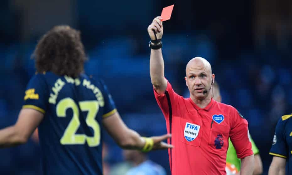 David Luiz is shown a red card by Anthony Taylor.