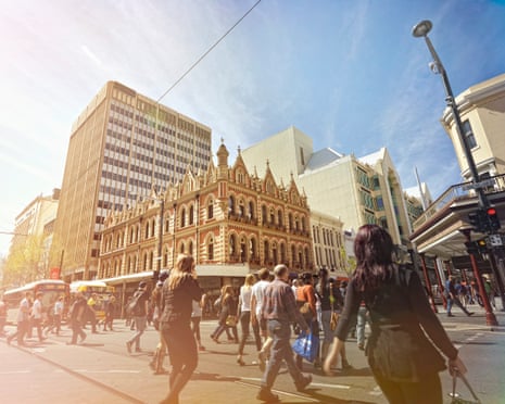 People walking through Adelaide city centre.