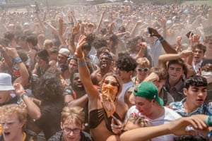 Fans react during the 30th anniversary of Lollapalooza at Grant Park, Chicago, Illinois