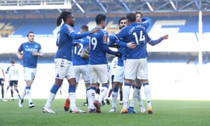 Cenk Tosun of Everton celebrates with team mates.