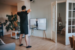 Man working out to a video