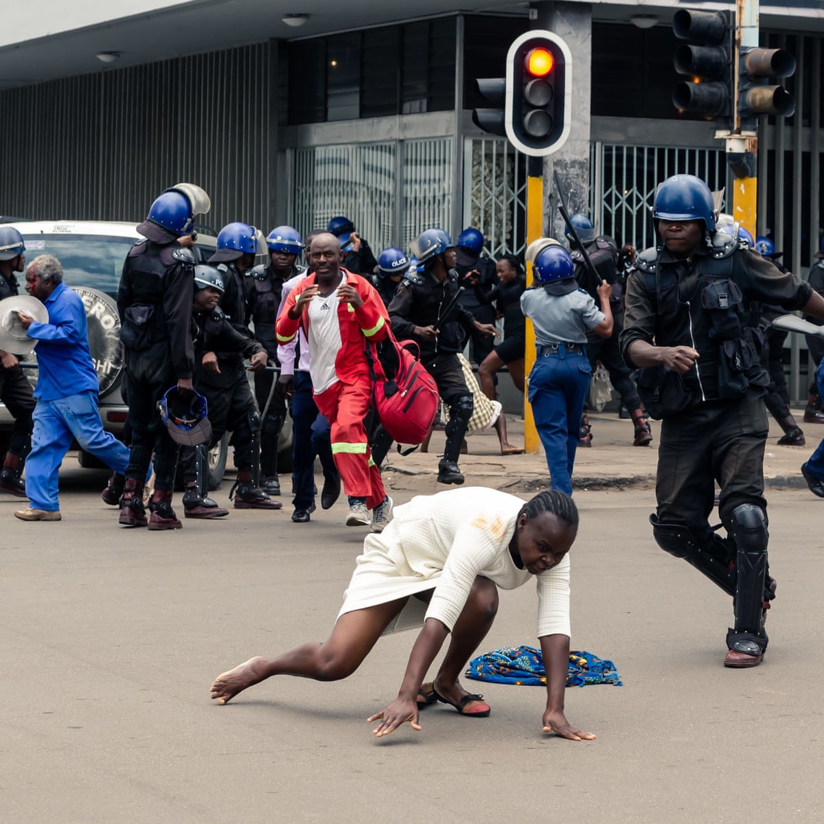 Zimbabwe riot police fire teargas at opposition supporters | World ...