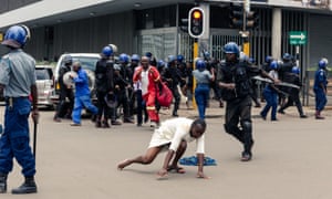 Download Zimbabwe Riot Police Fire Teargas At Opposition Supporters World Free HD Wallpaper Zimbabwe Riot Police Fire Teargas At Opposition Supporters World For iPhone