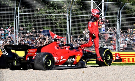 Ferrari's Charles Leclerc jumps out of the car after crashing on lap one of the Australian Grand Prix.