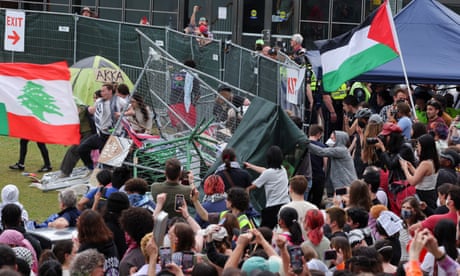 Pro-Palestinian student protesters break through police fencing at MIT
