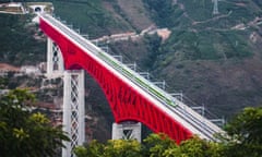 The China-Laos Railway crosses a major bridge over the Yuanjiang River in southwestern China's Yunnan Province.