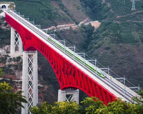 The China-Laos Railway crosses a major bridge over the Yuanjiang River in southwestern China's Yunnan Province.