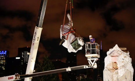 Christopher Columbus statue is removed from Grant Park in Chicago, Illinois Friday.